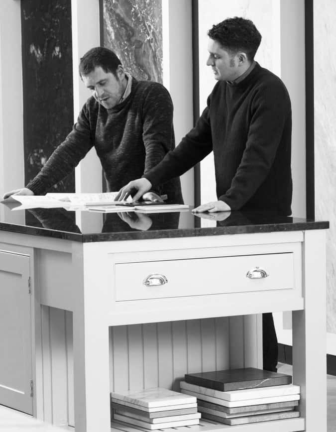 Working through a template on a stone worktop at the Miller Brothers workshop, Rathnew
