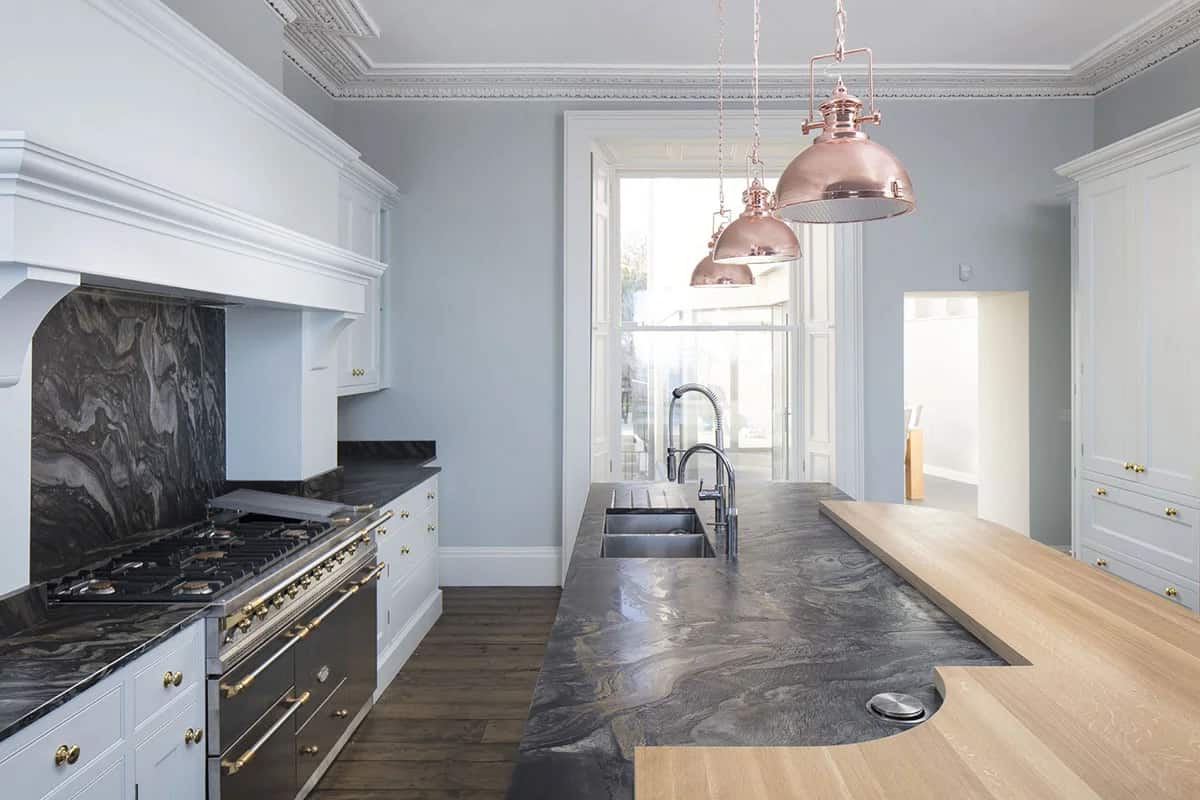 London Black Quartzite in a leather finish kitchen by Miller Brothers Stone, Copper Accents